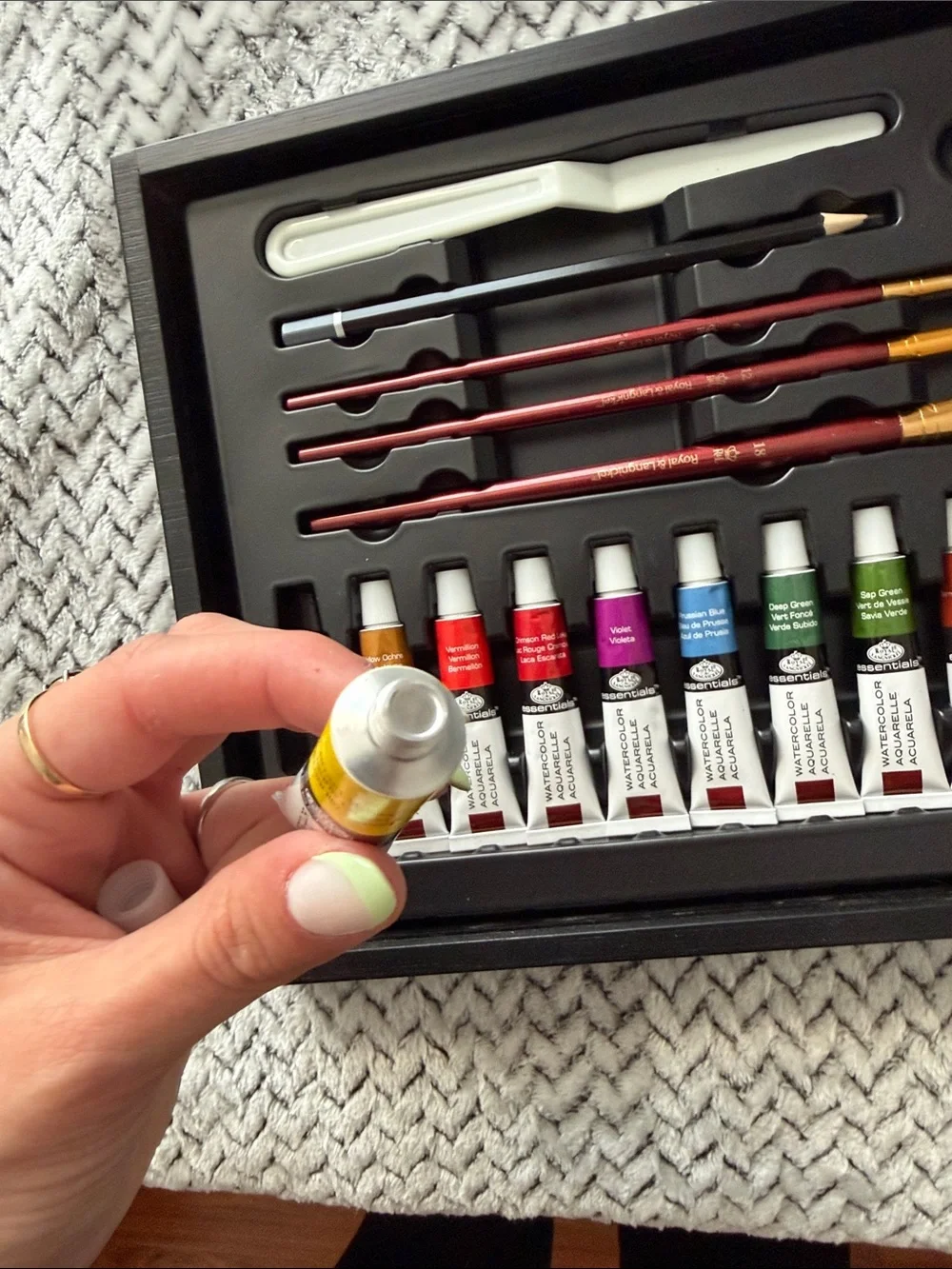 Black Artist Paint Set with Assorted Colors and Brushes